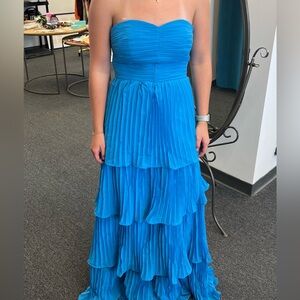 Blue tiered strapless gown